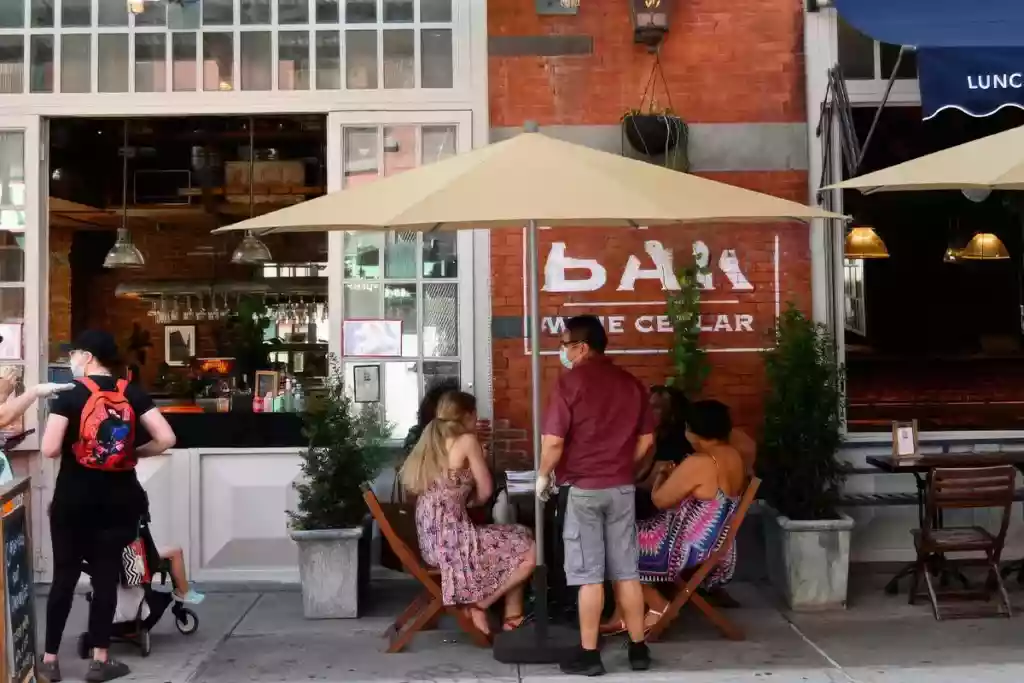 Shade umbrella for outdoor seating area