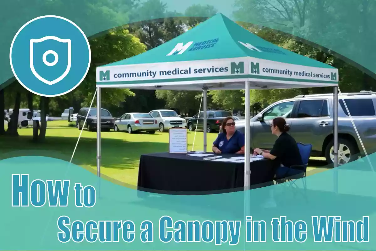 how to secure a canopy in the wind