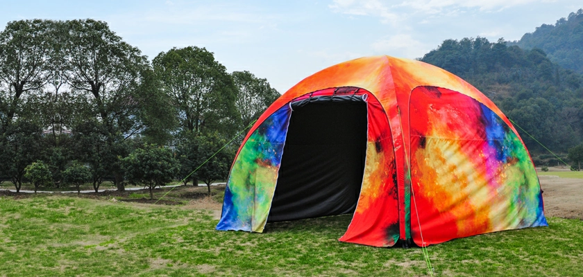 A custom printed basic inflatable canopy tent with a roll up wall