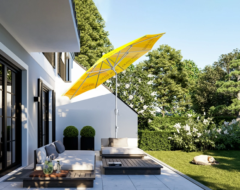 A tilt patio umbrella providing shade in a backyard