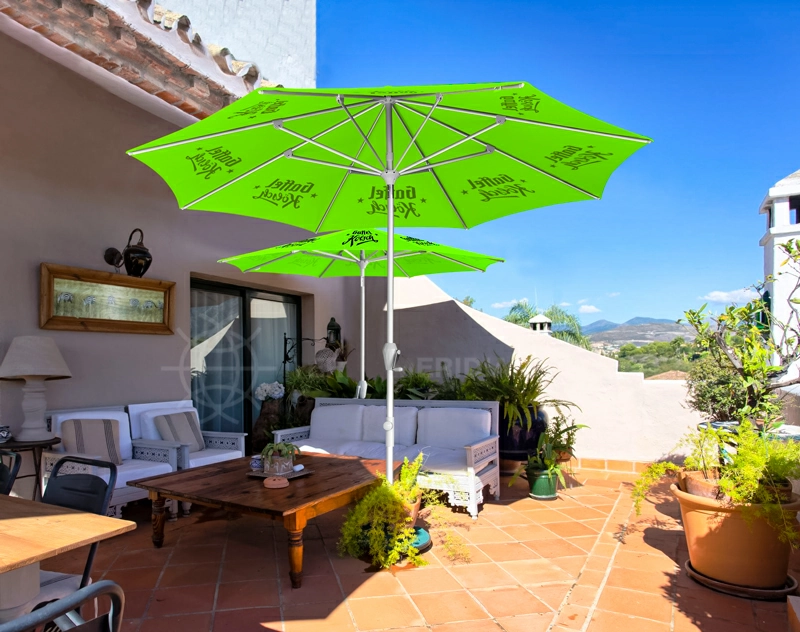 9ft custom green patio umbrella in a backyard