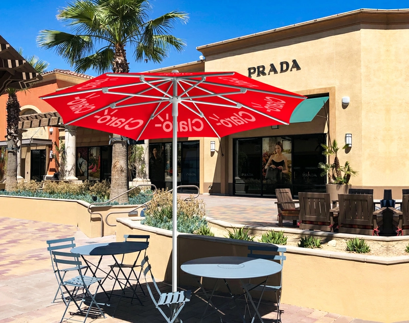 A market outdoor umbrella providing shade for outdoor dining