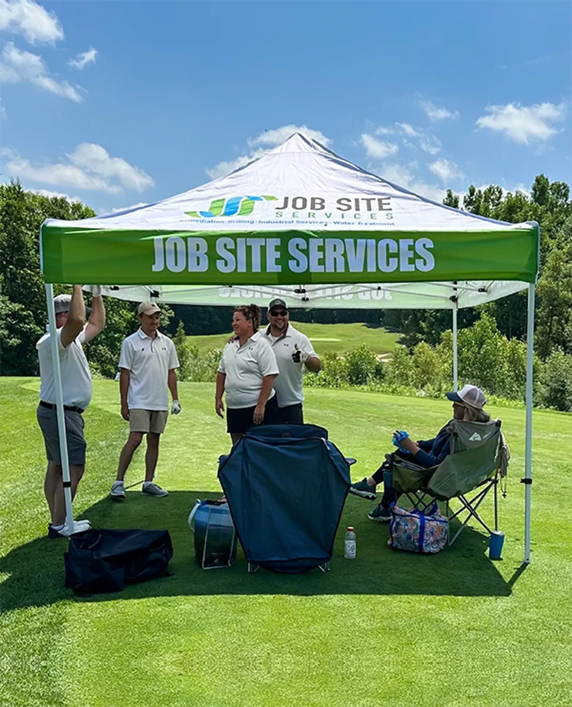 Custom 10x10 canopy tent with company logo for corporate golf tournaments.