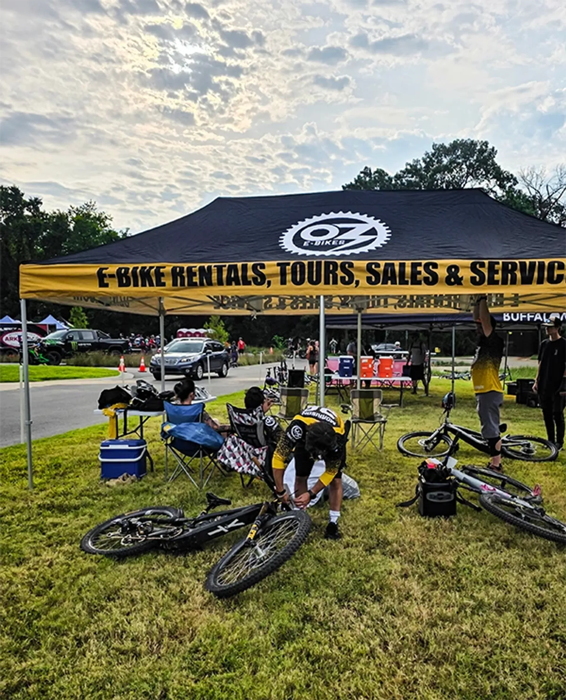 Heavy duty custom canopy tent used at outdoor cycling events and rentals.