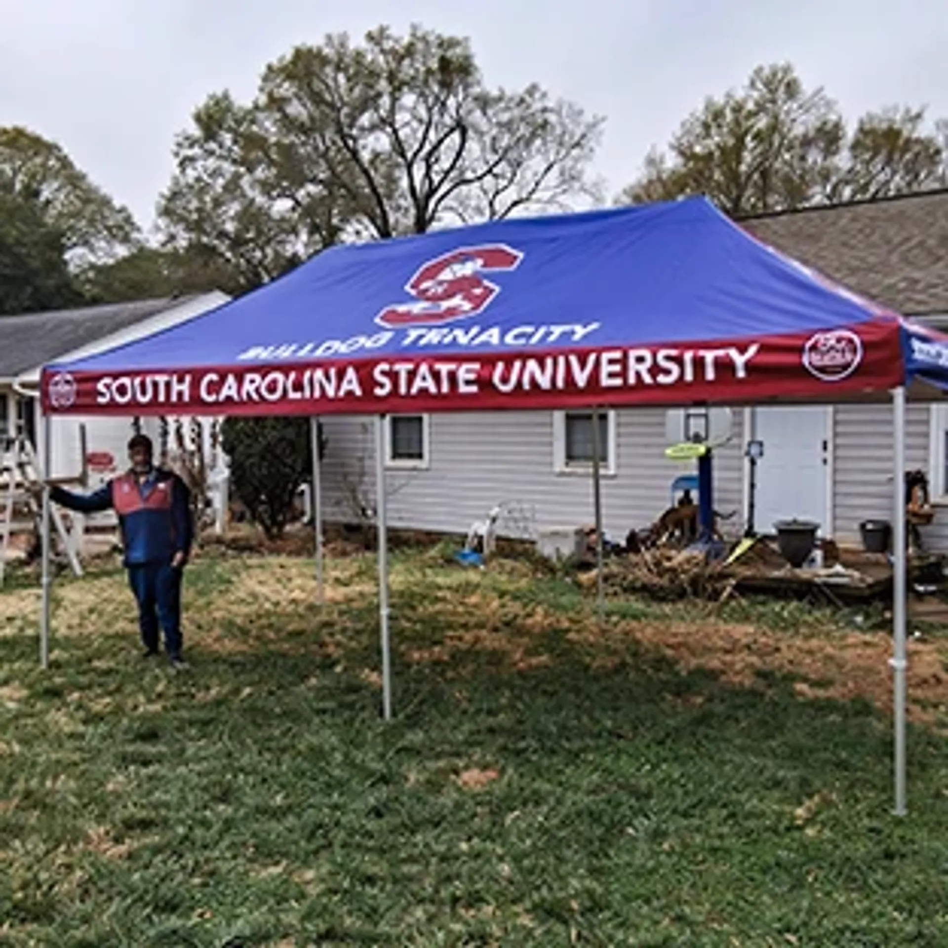 Custom printed canopy tent for university branding and outdoor sports events.