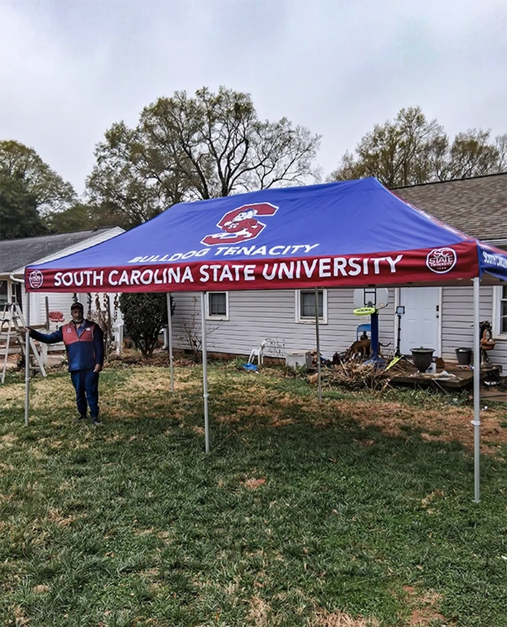 Custom printed canopy tent for university branding and outdoor sports events.