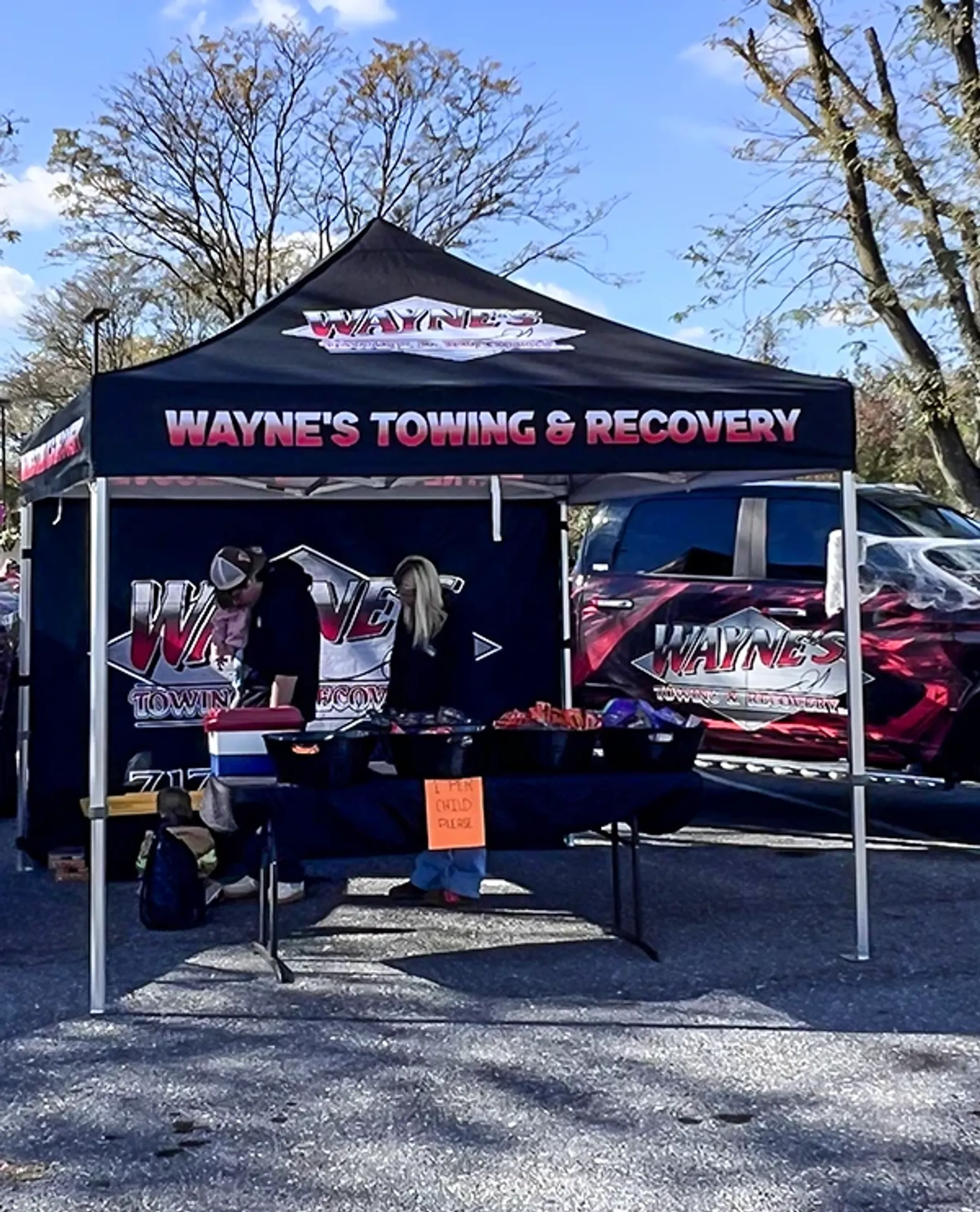 Black custom 10x10 pop up canopy tent with your logo graphics for local businesses.