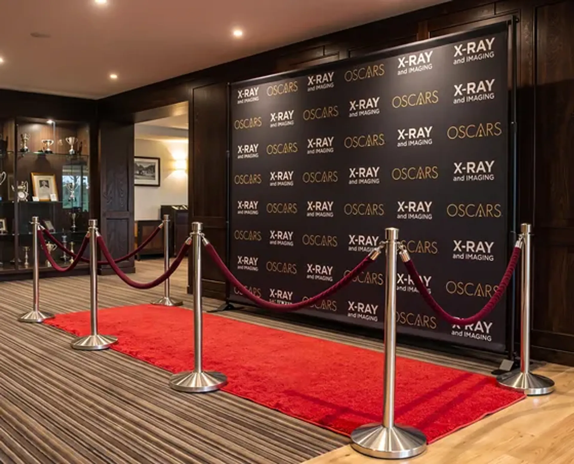 Red carpet step and repeat backdrop with repeated logo design10FT