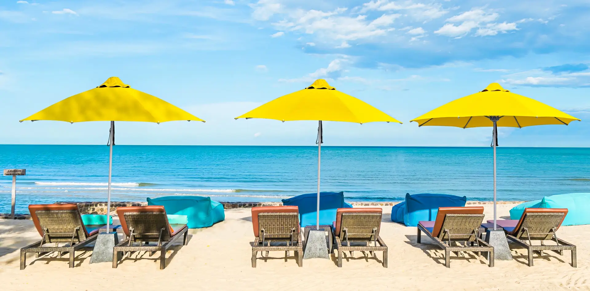 patio umbrellas on a beach